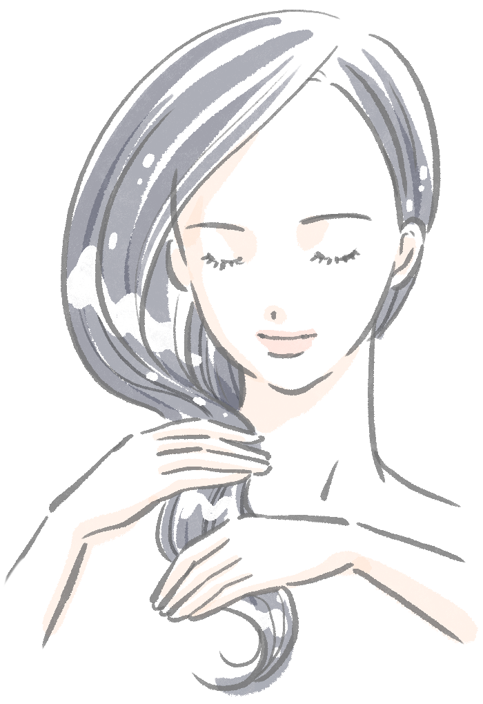 ヘアケアしている女性